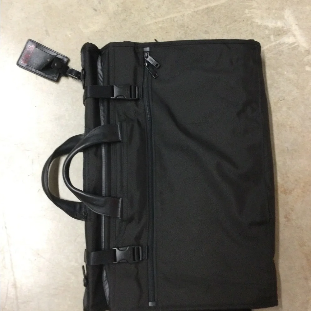 Tumi Black Men's Travel Duffel with Front Zip Pocket and Carry Handles